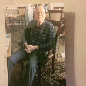 Joan added a photo of their purchase