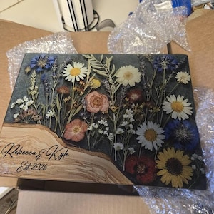 Liz added a photo of their purchase
