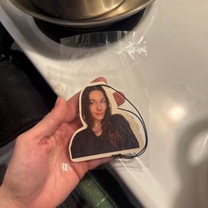 rhianna added a photo of their purchase