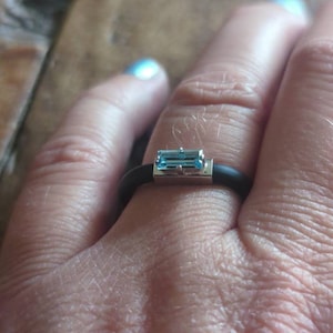 Elizabeth Barker added a photo of their purchase