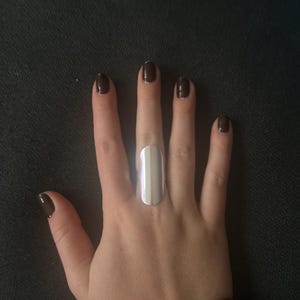 Sarah added a photo of their purchase