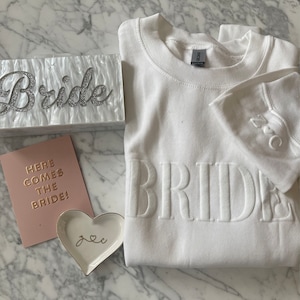 Roxanne added a photo of their purchase
