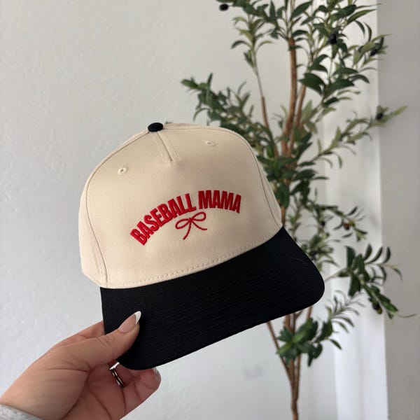 MM BASEBALL CAP IN WHITE FABRIC WITH LARGE BLACK BOW