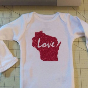 Katie added a photo of their purchase