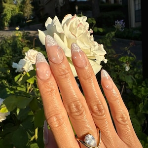 Tatiana added a photo of their purchase