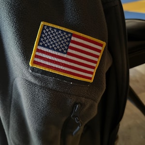 USA ferro su cucire su emblema bandiera americana Patch ricamata bordo oro