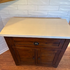 Laura added a photo of their purchase