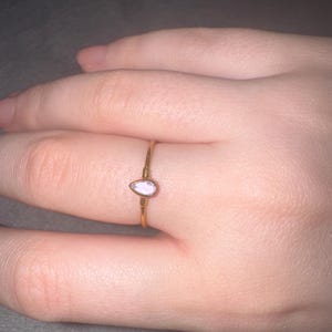 Customer photo from Grace, Amethyst Dainty Pear Ring
