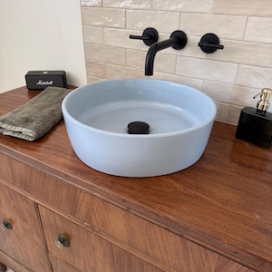 Aly added a photo of their purchase