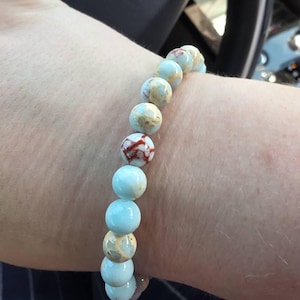 Kayleen added a photo of their purchase