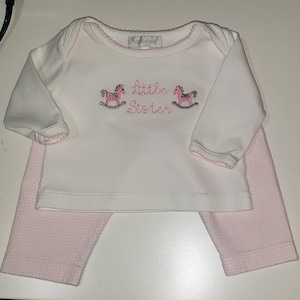 Laura added a photo of their purchase