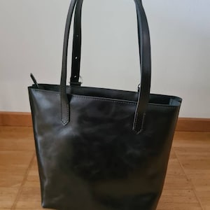 Claudia added a photo of their purchase