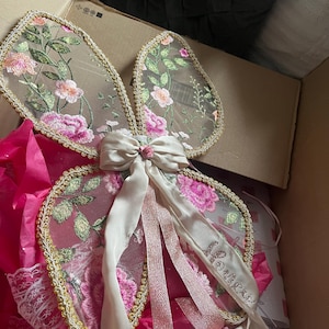 Aisha added a photo of their purchase