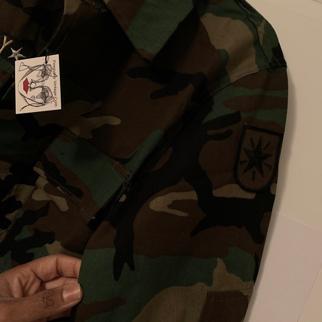 Freadaフリーダ／ミリタリージャケット カモフラージュ oblada - Sleeveless Military Jacket ミリタリージャケット