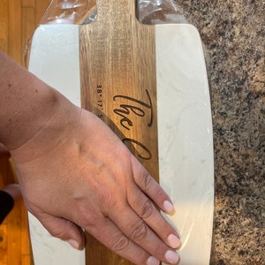 Kim added a photo of their purchase