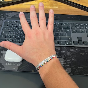 Alexander added a photo of their purchase