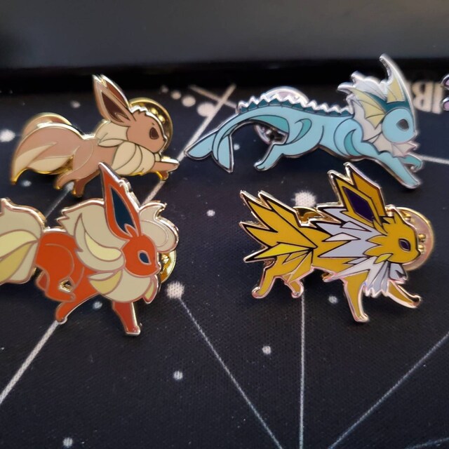 Eevee's Garden - A Floral Eeveelution Enamel Pin Set by EvilsCornerArt —  Kickstarter