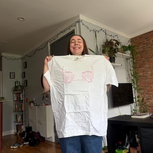 Sarah added a photo of their purchase