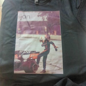 Alex added a photo of their purchase