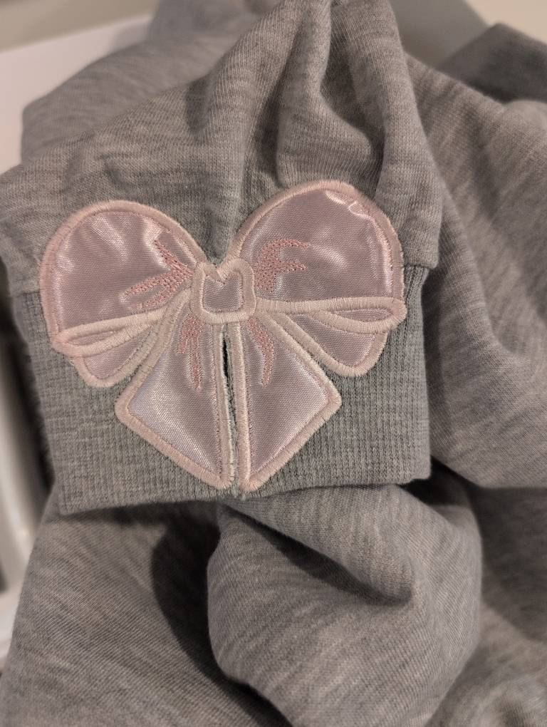 Customer project using Valentine Heart Split Side Bow Applique embroidery design