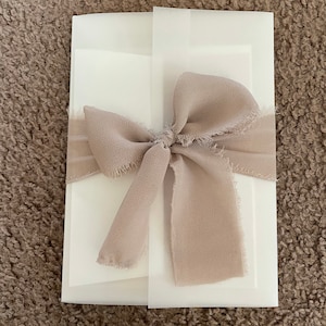 Angela added a photo of their purchase