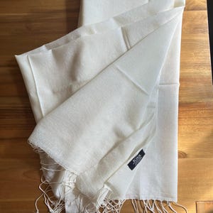 Gina added a photo of their purchase