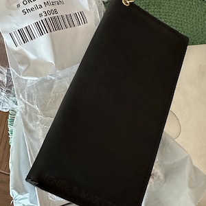 Sheila added a photo of their purchase