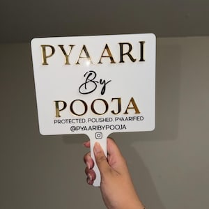 pooja lade till en bild av sitt köp