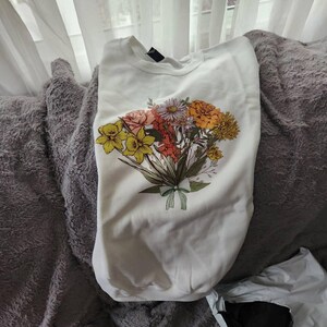 Rebecca added a photo of their purchase