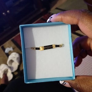 Tasha added a photo of their purchase