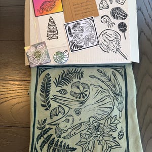 Sarah added a photo of their purchase