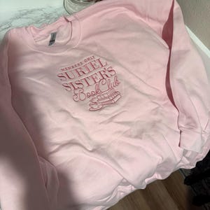 Isabelle added a photo of their purchase