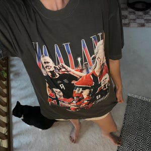 Sara added a photo of their purchase
