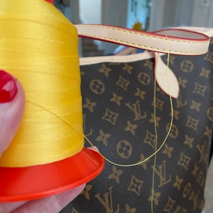 vuitton yellow thread