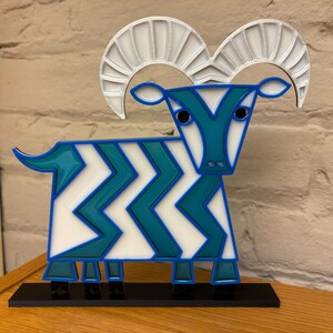 5 Legged Goat Contemporary Resort Mary Blair Inspired Suncatcher