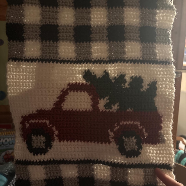 A customer's finished Red Christmas Truck Table Runner Crochet Pattern + Video