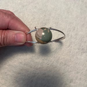 Charlotte added a photo of their purchase