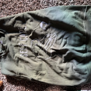 Kimmie added a photo of their purchase