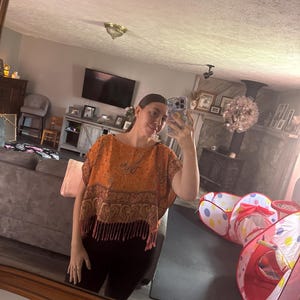 Sarina added a photo of their purchase