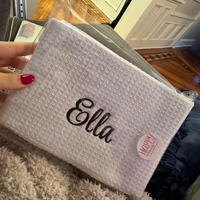 Monogram tarpaulin printed make-up bag