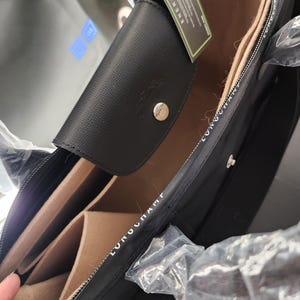 Cynthia added a photo of their purchase