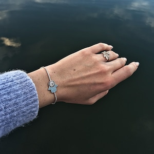 Sharon added a photo of their purchase