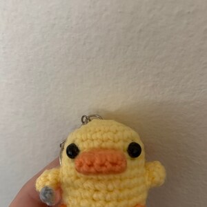 duck plushie with knife