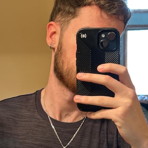 Caleb added a photo of their purchase