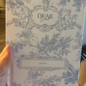 Cynthia added a photo of their purchase