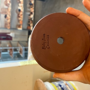 Baby lade till en bild av sitt köp