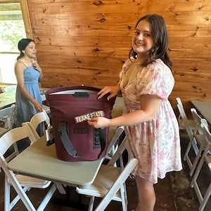 Christina added a photo of their purchase