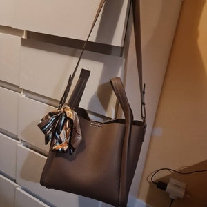 Marie-Laure added a photo of their purchase