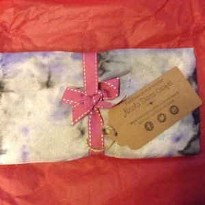 Sarah added a photo of their purchase