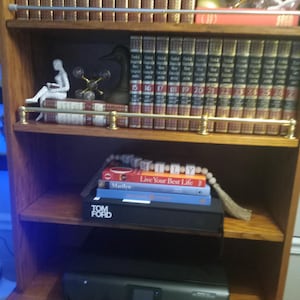 Brass Gallery Rail attaches to top perimeter of antique desks, bookcases, cabinets and shelving.